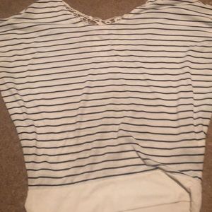 A white striped t-shirt with navy blue stripes